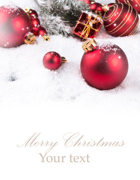 Red balls decorations on snow, Christmas celebration concept, Holiday object with free space for text 