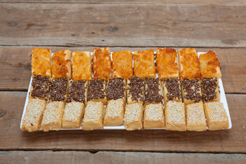Salty pastries with cheese, sesame seeds and linseed