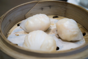 Fototapeta na wymiar Stream Shrimp and Pork Dumpling in bamboo basket, Chinese Dumpling know as 