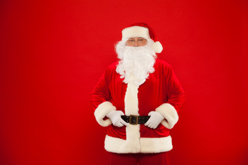 Photo of happy Santa Claus in eyeglasses looking at camera