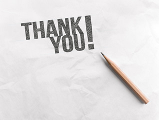 Pencil draw word Thank you on paper with copy space, idea concep