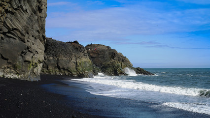 Landscape of Dyrholaey cape, volcanic sand beach, South Iceland