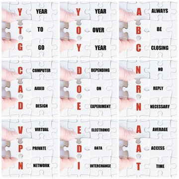 Hand of business man completing the puzzle