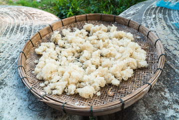 Sticky rice dry out on rice winnowing basket