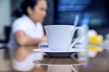 cup coffe start work for day with blue women meeting