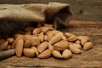 Almond nuts in a burlap bag
