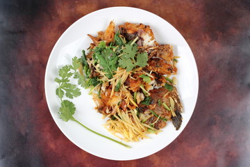 Fried ginger with Tilapia fish  (Call Pla Nil Pad Khing in Thai) 