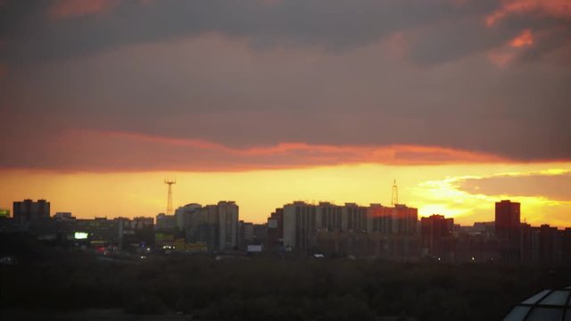 Timelapse of amazing sunset over silhouette city skyline. 1920x1080