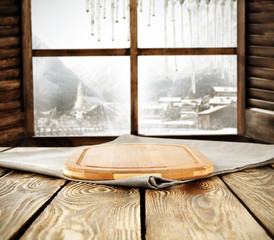 wooden desk and window space 