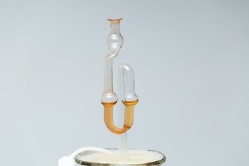 Demijohn with glass fermentation lock.