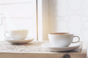 cups of coffee on the wood board