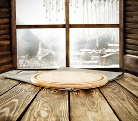 wooden desk and window space 