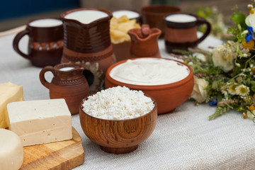 Dairy products on wooden table.