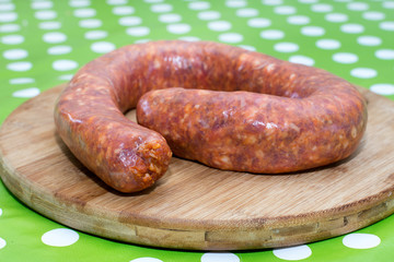Domestic sausages on the cutting board
