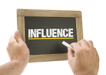 Influence / Hand writing on chalkboard