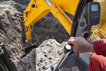 excavator digging hole ground © VILevi