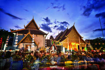 Inthakhin traditional Offerings of flowers.Thai offering flowers attended a ceremony to worship the city pillar at Wat Chedi Luang in Chiangmai Thailand.