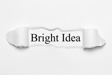 Fototapeta premium Bright Idea on white torn paper