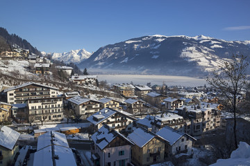 Zell am See town over the Zell lake and Alps