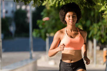 Fototapeta na wymiar Runner woman. Fitness jogging workout concept.