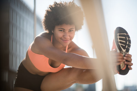 Exercise Daily, Stay Fit. Smiling Woman Athlete.