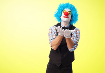 Fototapeta na wymiar portrait of a clown sending a kiss
