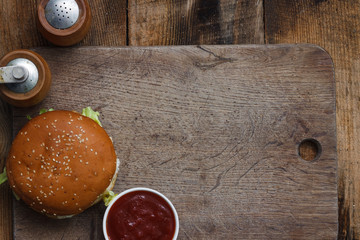 Sandwich hamburger with juicy burgers, cheese and mix of cabbage. Top view