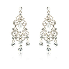 Pair of silver diamond earrings isolated on white