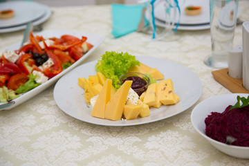 cheese plate on a decorated table