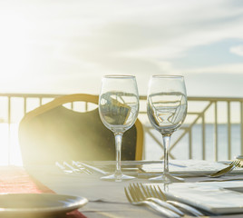 festive table in the gazebo at sunset