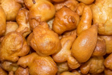 Small homemade donuts for party background
