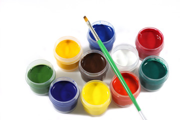 jars with gouache on white background