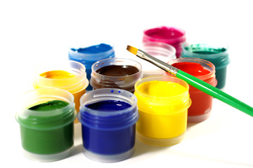 jars with gouache on white background