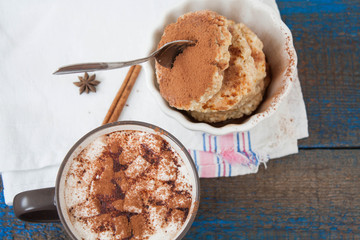Russian cheese pancakes and cocoa with marshmallow on a wooden background. sweet delicious Russian food