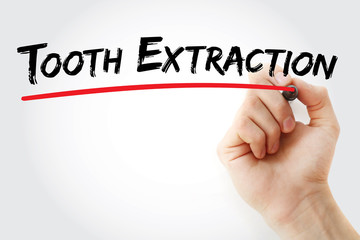Hand writing Tooth extraction with marker, concept background