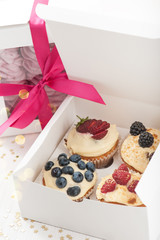 Blueberry delicious cupcakes in a paper box