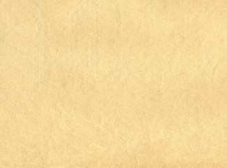 Texture of old turning yellow sheet of paper