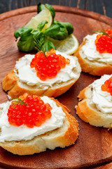 Canapes with red caviar
