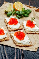 Canapes with red caviar