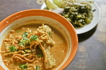 Curried Noodle Soup with Chicken ( Khao Soi) name food in Thailand.