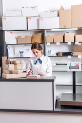 woman working at the post office