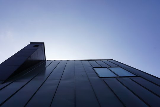 Sun over a modern building