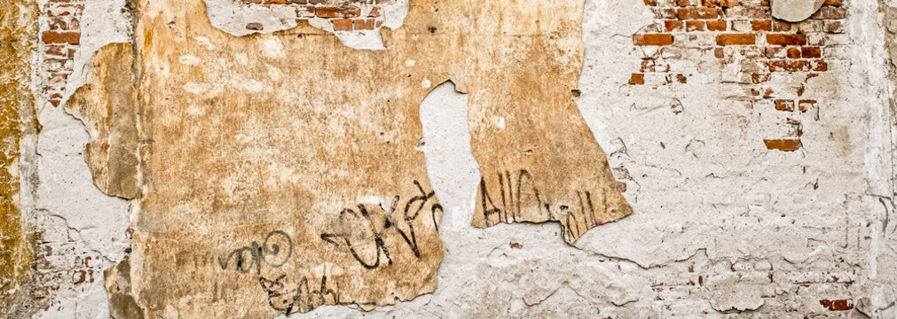 Old Brick Wall With Plaster Fallen