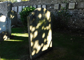 Light Spots on Grave Head Stone