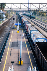 The train station with a passing train.