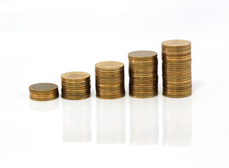 Golden coins stack growing up on white background. Growth business and financial concept.
