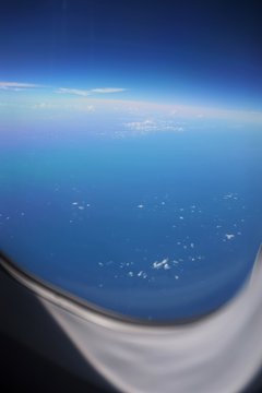 Sky view on airplane window