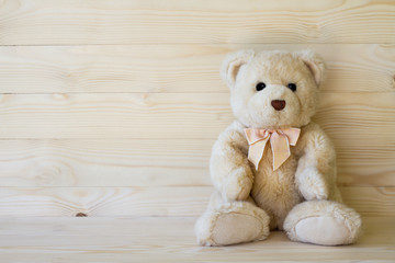 Teddy Bear on wooden floor