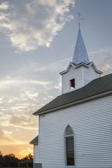 Fototapeta na wymiar Country church at sunset