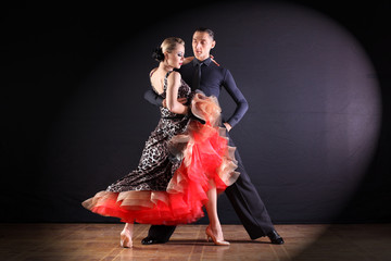 dancers in ballroom isolated on black background